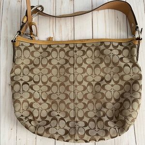 Coach signature bag hobo style.